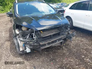 2018 Ford Escape Titanium with VIN 1FMCU9J94JUC98805, listed as a IAAI auction lot 42718214 with 36,689 mi miles and . Bid and sale history available at DreamBid. Image 6.