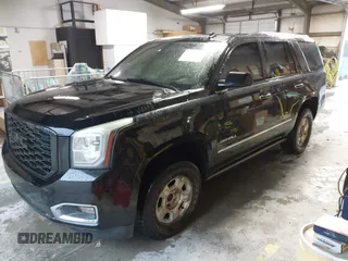 2015 GMC Yukon Denali with VIN 1GKS2CKJ4FR173703, listed as a IAAI auction lot 41943537 with 167,834 mi miles. Bid and sale history available at carsss.com. Image 2.