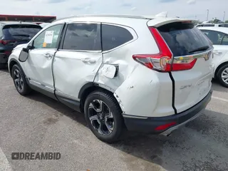2018 Honda CR-V Touring with VIN 5J6RW2H99JL020598, listed as a IAAI auction lot 42104765 with 30,431 mi miles and . Bid and sale history available at carsss.com. Image 3.