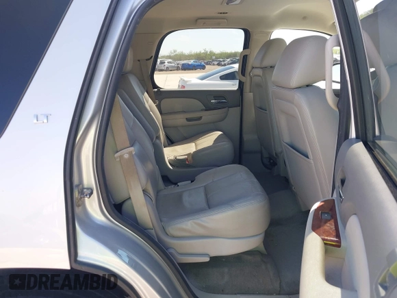 2013 Chevrolet Tahoe LT with VIN 1GNSCBE07DR164486, listed as a IAAI auction lot 42216421 with 220,395 mi miles and . Bid and sale history available at DreamBid. Image 8.