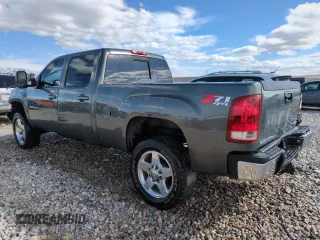 2011 GMC Sierra 2500HD SLT z VIN 1GT121E86BF126737, wystawiony jako Copart lot #48694115 z przebiegiem 223 128 mil mil oraz Szkoda całkowita • Salvage title. Historia ofert i sprzedaży dostępna na DreamBid. Obrazek 2.