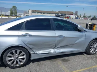 2013 Hyundai Sonata Limited with VIN 5NPEC4AC8DH668294, listed as a IAAI auction lot 41884592 with 137,709 mi miles and . Bid and sale history available at DreamBid. Image 6.
