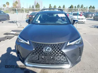 2022 Lexus UX with VIN JTHX3JBH6N2056436, listed as a IAAI auction lot 41856541 with 12,815 mi miles. Bid and sale history available at carsss.com. Image 12.