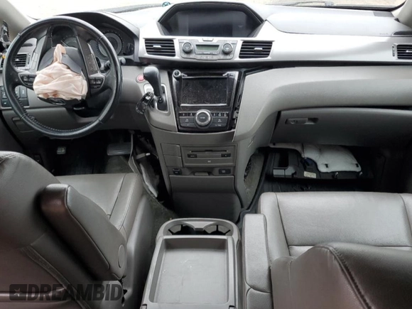 2014 Honda Odyssey Touring z VIN 5FNRL5H91EB089813, wystawiony jako Copart lot #58674275 z przebiegiem Nie podano mil oraz Szkoda całkowita • Salvage title. Historia ofert i sprzedaży dostępna na DreamBid. Obrazek 8.