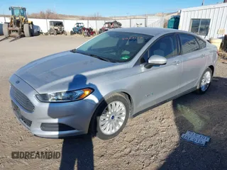 2015 Ford Fusion S Hybrid with VIN 3FA6P0UU0FR307900, listed as a IAAI auction lot 41507112 with 150,257 mi miles. Bid and sale history available at carsss.com. Image 2.