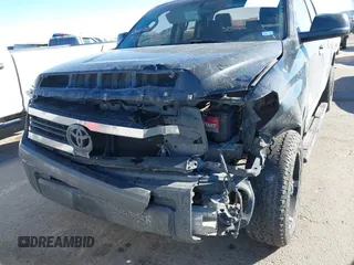 2014 Toyota Tundra 4WD Truck SR with VIN 5TFUM5F17EX051674, listed as a IAAI auction lot 41296906 with 140,782 mi miles. Bid and sale history available at carsss.com. Image 12.