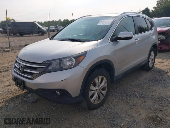 2013 Honda CR-V EX-L with VIN 2HKRM4H74DH628155, listed as a IAAI auction lot 42881796 with 208,334 mi miles and . Bid and sale history available at DreamBid. Image 2.