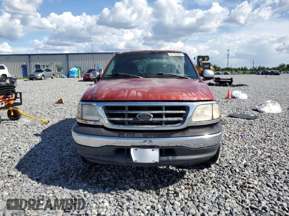 2000 Ford F-150 XL with VIN 1FTRX17W3YNB80866, listed as a Copart auction lot 61151005 with Not provided miles and Salvage title. Bid and sale history available at DreamBid. Image 5.