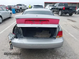 1997 Saturn SL with VIN 1G8ZK527XVZ257477, listed as a IAAI auction lot 42029648 with 114,371 mi miles and . Bid and sale history available at DreamBid. Image 16.