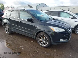 2015 Ford Escape Titanium с VIN 1FMCU0JX1FUC77685, выставлен на аукционе IAAI как лот 42181869 с пробегом 165 826 миль миль и . История ставок и продаж доступна на DreamBid. Изображение 1.