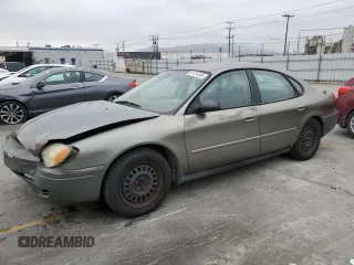 2004 Ford Taurus LX with VIN 1FAFP52U74G124921, listed as a Copart auction lot 61724495 with 154,155 mi miles and Salvage title. Bid and sale history available at DreamBid. Image 1.