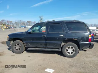 2005 GMC Yukon Denali z VIN 1GKEK63U55J254214, wystawiony jako IAAI lot #42103378 z przebiegiem 131 183 mil mil oraz . Historia ofert i sprzedaży dostępna na DreamBid. Obrazek 13.