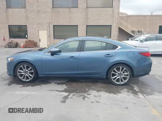 2014 Mazda 6 i Grand Touring with VIN JM1GJ1W64E1133729, listed as a IAAI auction lot 42050222 with 112,464 mi miles and . Bid and sale history available at DreamBid. Image 14.