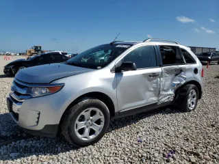 2014 Ford Edge SE z VIN 2FMDK4GC6EBB07123, wystawiony jako Copart lot #53920795 z przebiegiem 142 034 mil mil oraz Szkoda całkowita • Salvage title. Historia ofert i sprzedaży dostępna na DreamBid. Obrazek 1.
