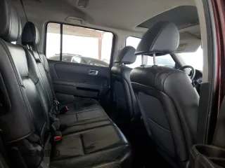 2012 Honda Pilot EX-L z VIN 5FNYF3H50CB014571, wystawiony jako Copart lot #55360825 z przebiegiem 172 956 mil mil oraz Czysty tytuł • Clean title. Historia ofert i sprzedaży dostępna na DreamBid. Obrazek 11.