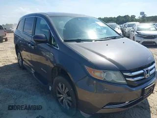 2014 Honda Odyssey EX-L with VIN 5FNRL5H61EB103103, listed as a IAAI auction lot 42159180 with 165,651 mi miles and . Bid and sale history available at carsss.com. Image 1.