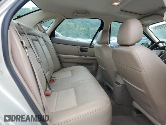 2006 Ford Taurus SEL with VIN 1FAFP56U86A194072, listed as a Copart auction lot 63779615 with 77,377 mi miles and Salvage title. Bid and sale history available at DreamBid. Image 10.