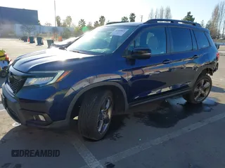 2020 Honda Passport Touring with VIN 5FNYF7H90LB004665, listed as a IAAI auction lot 41669821 with 59,768 mi miles and . Bid and sale history available at DreamBid. Image 18.
