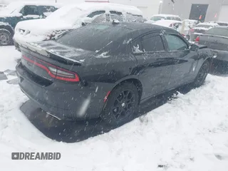 2015 Dodge Charger SXT with VIN 2C3CDXJG8FH746291, listed as a IAAI auction lot 41102488 with 189,971 mi miles. Bid and sale history available at carsss.com. Image 4.