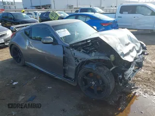 2012 Nissan 370Z z VIN JN1AZ4EH5CM562119, wystawiony jako IAAI lot #42214475 z przebiegiem Nie podano mil oraz . Historia ofert i sprzedaży dostępna na DreamBid. Obrazek 1.