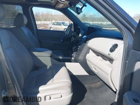 2013 Honda Pilot EX-L with VIN 5FNYF3H79DB037477, listed as a IAAI auction lot 41649734 with 161,902 mi miles and . Bid and sale history available at DreamBid. Image 5.