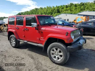 2012 Jeep Wrangler Unlimited Sahara with VIN 1C4BJWEG0CL128417, listed as a Copart auction lot 56243815 with 95,635 mi miles and Salvage title. Bid and sale history available at DreamBid. Image 4.