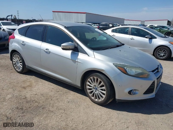 2012 Ford Focus Titanium with VIN 1FAHP3N20CL402944, listed as a IAAI auction lot 41784935 with NaN miles. Bid and sale history available at carsss.com. Image 1.