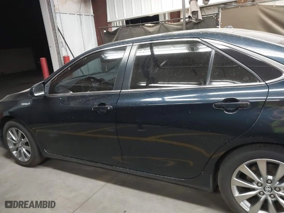 2016 Toyota Camry Hybrid LE with VIN 4T1BD1FK7GU200089, listed as a IAAI auction lot 41660011 with NaN miles. Bid and sale history available at carsss.com. Image 14.