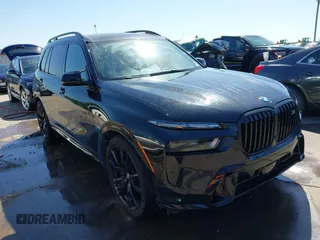 2024 BMW X7 M60i with VIN 5UX33EM09R9U06877, listed as a IAAI auction lot 41919988 with 25,015 mi miles. Bid and sale history available at carsss.com. Image 1.