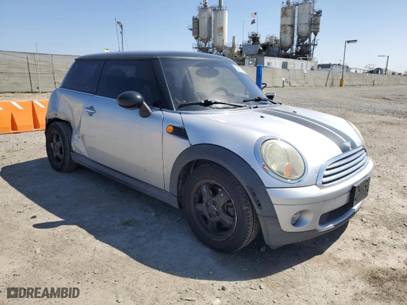 2009 MINI Cooper Hardtop with VIN WMWMF33579TU72374, listed as a Copart auction lot 50092815 with 127,140 mi miles and Salvage Title. Bid and sale history available at carsss.com. Image 4.