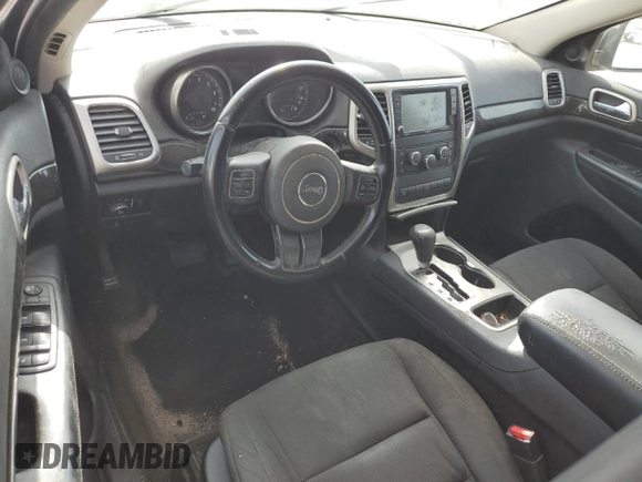 2012 Jeep Grand Cherokee Laredo with VIN 1C4RJEAG1CC306950, listed as a Copart auction lot 84912434 with 128,659 mi miles and Salvage Title. Bid and sale history available at carsss.com. Image 8.