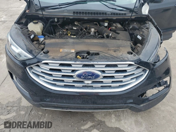 2020 Ford Edge SEL z VIN 2FMPK3J90LBA44070, wystawiony jako Copart lot #54606065 z przebiegiem 63 153 mil mil oraz Szkoda całkowita • Salvage title. Historia ofert i sprzedaży dostępna na DreamBid. Obrazek 11.