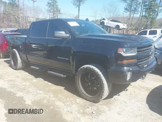 2017 Chevrolet Silverado 1500 LT with VIN 3GCUKREC1HG358752, listed as a IAAI auction lot 41775110 with 150,528 mi miles and . Bid and sale history available at DreamBid. Image 1.