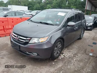 2016 Honda Odyssey Touring Elite with VIN 5FNRL5H96GB063176, listed as a IAAI auction lot 42157604 with 106,177 mi miles. Bid and sale history available at carsss.com. Image 20.