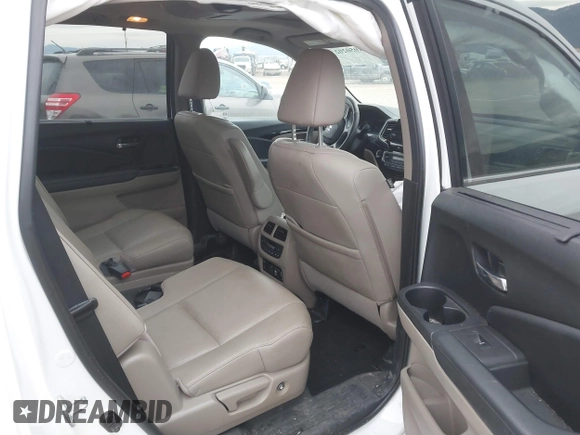 2021 Honda Pilot Elite with VIN 5FNYF6H03MB044154, listed as a IAAI auction lot 41050202 with 60,331 mi miles and . Bid and sale history available at DreamBid. Image 8.