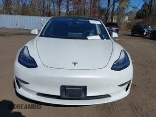 2020 Tesla Model 3 Standard Range Plus with VIN 5YJ3E1EA0LF783672, listed as a IAAI auction lot 41903431 with 52,157 mi miles and . Bid and sale history available at carsss.com. Image 12.