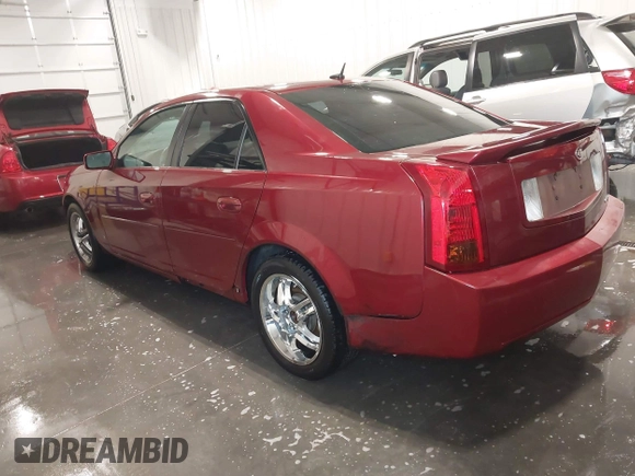 2006 Cadillac CTS with VIN 1G6DM57T560167128, listed as a IAAI auction lot 41911884 with 129,678 mi miles. Bid and sale history available at carsss.com. Image 3.
