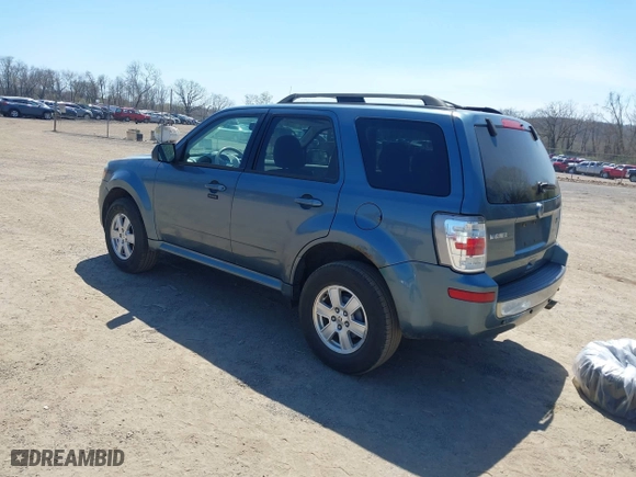 2010 Mercury Mariner with VIN 4M2CN8BG3AKJ01945, listed as a IAAI auction lot 42025848 with 124,617 mi miles. Bid and sale history available at carsss.com. Image 3.