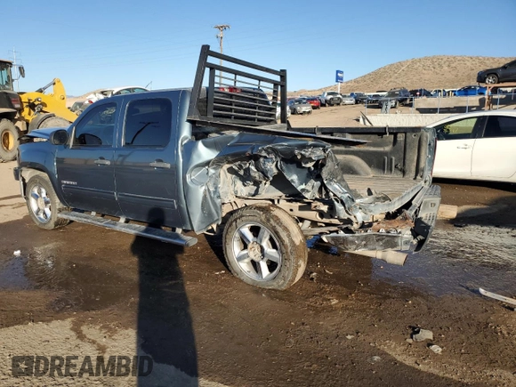 2010 GMC Sierra 1500 with VIN 3GTXKVE26AG101850, listed as a Copart auction lot 82770984 with 175,714 mi miles and Salvage Title. Bid and sale history available at DreamBid. Image 2.