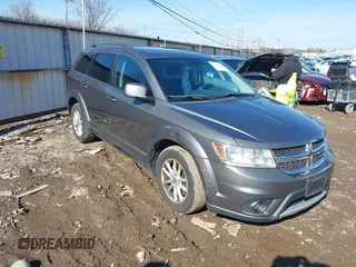 2013 Dodge Journey SXT with VIN 3C4PDDBG6DT580352, listed as a IAAI auction lot 41547504 with 183,871 mi miles and . Bid and sale history available at DreamBid. Image 1.