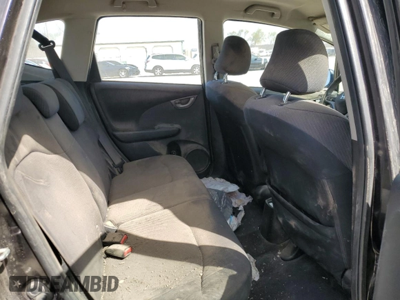 2013 Honda Fit Sport z VIN JHMGE8H68DC053863, wystawiony jako Copart lot #52140945 z przebiegiem Nie podano mil oraz Szkoda całkowita • Salvage title. Historia ofert i sprzedaży dostępna na DreamBid. Obrazek 10.