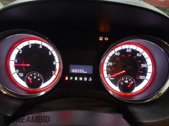 2012 Dodge Grand Caravan SE with VIN 2C4RDGBG8CR367236, listed as a IAAI auction lot 40041863 with 166,555 mi miles and . Bid and sale history available at DreamBid. Image 7.