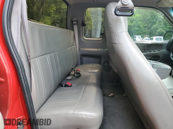 1997 Ford F-150 with VIN 1FTDX1767VNA57898, listed as a Copart auction lot 60908125 with 236,399 mi miles and Salvage title. Bid and sale history available at DreamBid. Image 10.