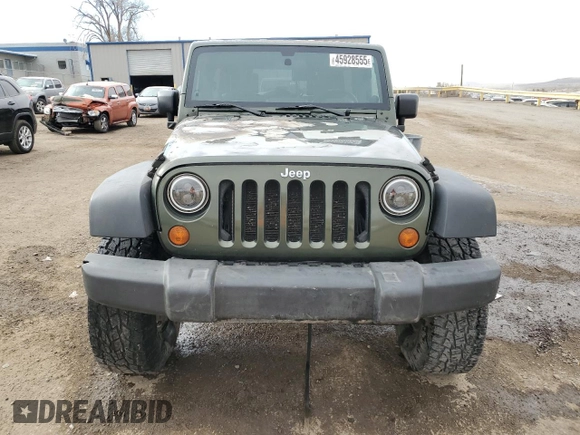 2007 Jeep Wrangler Unlimited X z VIN 1J4GA39197L181305, wystawiony jako Copart lot #45928555 z przebiegiem Nie podano mil oraz Szkoda całkowita • Salvage title. Historia ofert i sprzedaży dostępna na DreamBid. Obrazek 5.