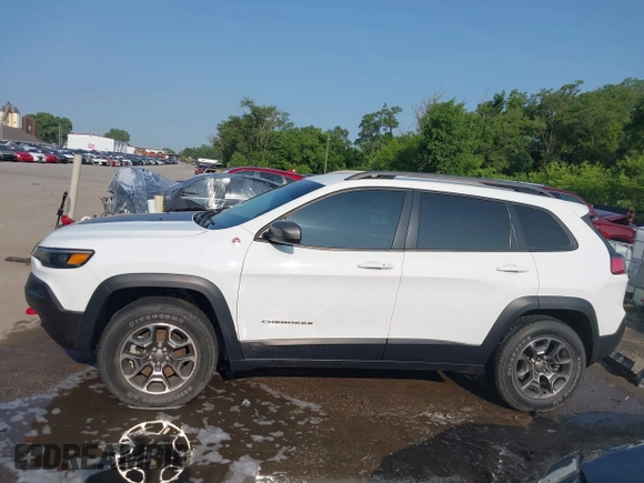 2021 Jeep Cherokee Trailhawk with VIN 1C4PJMBX4MD124980, listed as a IAAI auction lot 42372537 with 55,667 mi miles and . Bid and sale history available at DreamBid. Image 15.