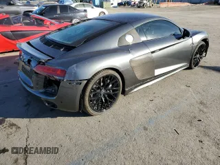 2017 Audi R8 z VIN WUAKBAFX6H7903367, wystawiony jako Copart lot #83113234 z przebiegiem 14 352 mil mil oraz Szkody całkowita. Historia ofert i sprzedaży dostępna na DreamBid. Obrazek 3.