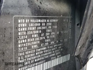 2015 Volkswagen Tiguan SE z VIN WVGBV7AXXFW606017, wystawiony jako Copart lot #51005745 z przebiegiem Nie podano mil oraz Szkoda całkowita • Salvage title. Historia ofert i sprzedaży dostępna na DreamBid. Obrazek 12.