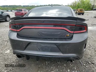 2020 Dodge Charger Scat Pack z VIN 2C3CDXGJ2LH180210, wystawiony jako Copart lot #54559495 z przebiegiem 67 929 mil mil oraz Szkoda całkowita • Salvage title. Historia ofert i sprzedaży dostępna na DreamBid. Obrazek 6.