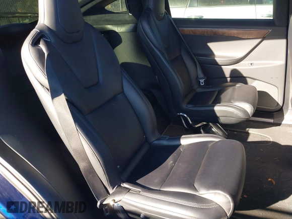 2017 Tesla Model X 90D z VIN 5YJXCBE21HF076514, wystawiony jako IAAI lot #41559020 z przebiegiem 108 573 mil mil oraz . Historia ofert i sprzedaży dostępna na DreamBid. Obrazek 8.