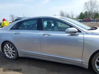 2016 Lincoln MKZ with VIN 3LN6L2G90GR625733, listed as a IAAI auction lot 41990706 with 104,962 mi miles. Bid and sale history available at carsss.com. Image 13.